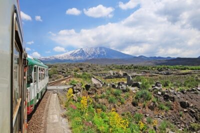 Train,Moves,Around,Etna,Volcano.,Sicily.,Italy.